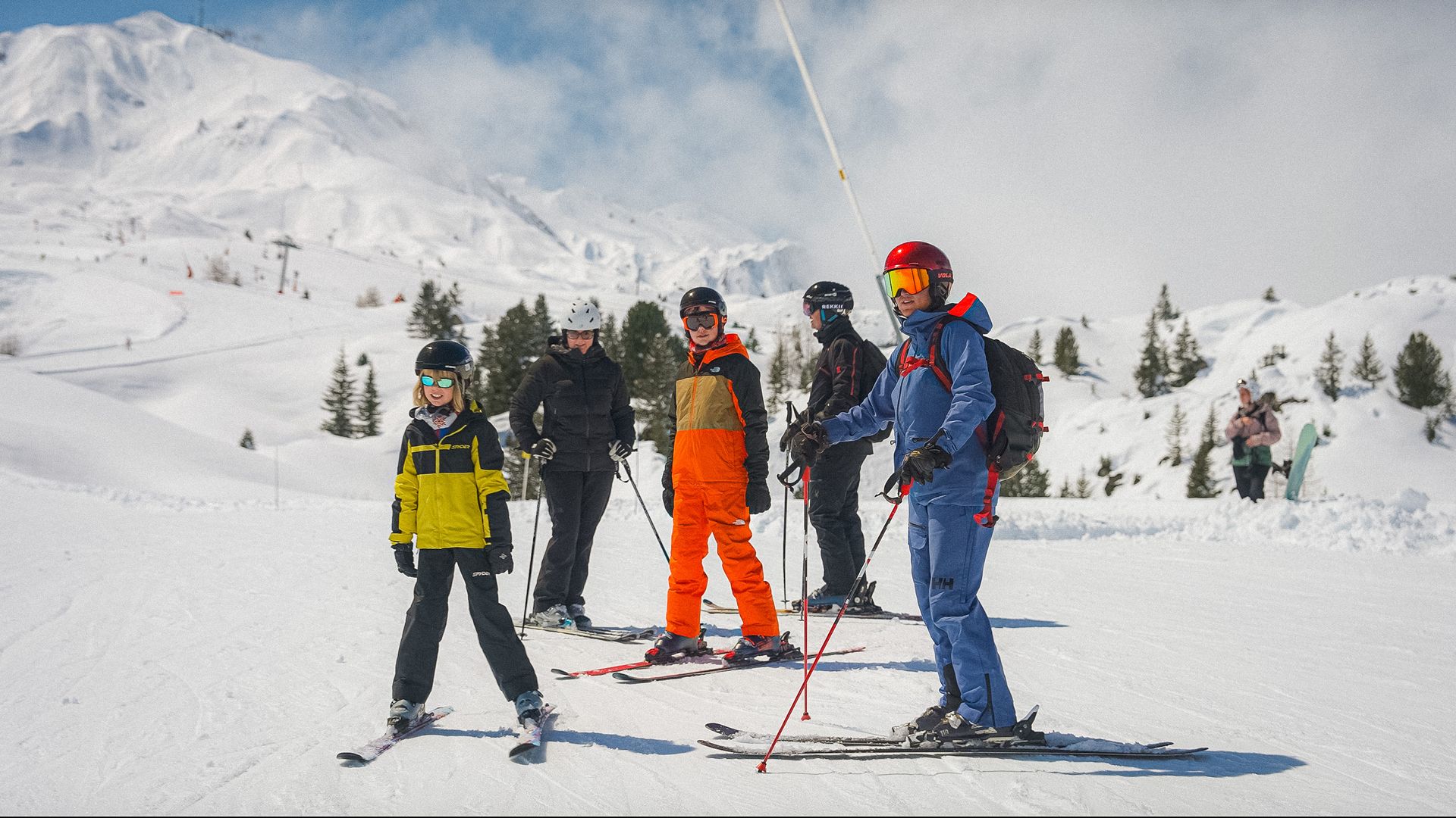 Prepare for an exciting day on the slopes with guidance from our professional ski instructors. Ski instructor briefing her group before a lesson in the beautiful resorts of Savoie and Tarentaise.